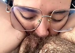 Lesbian sucking a sweet hairy bush