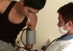 Pissing Asian twink fucked by doctor
