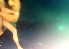 Underwater sex in public pool filmed with a hidden cam