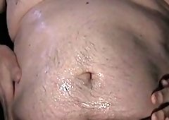 Oiled up big cock, belly and cock jerking