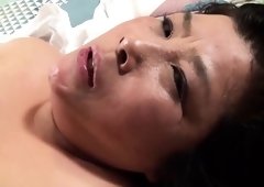Curvy Asian housewife has a young guy satisfying her needs